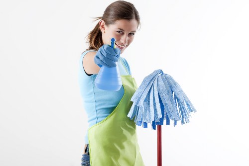 Carpet cleaning staff preparing equipment safely before starting work